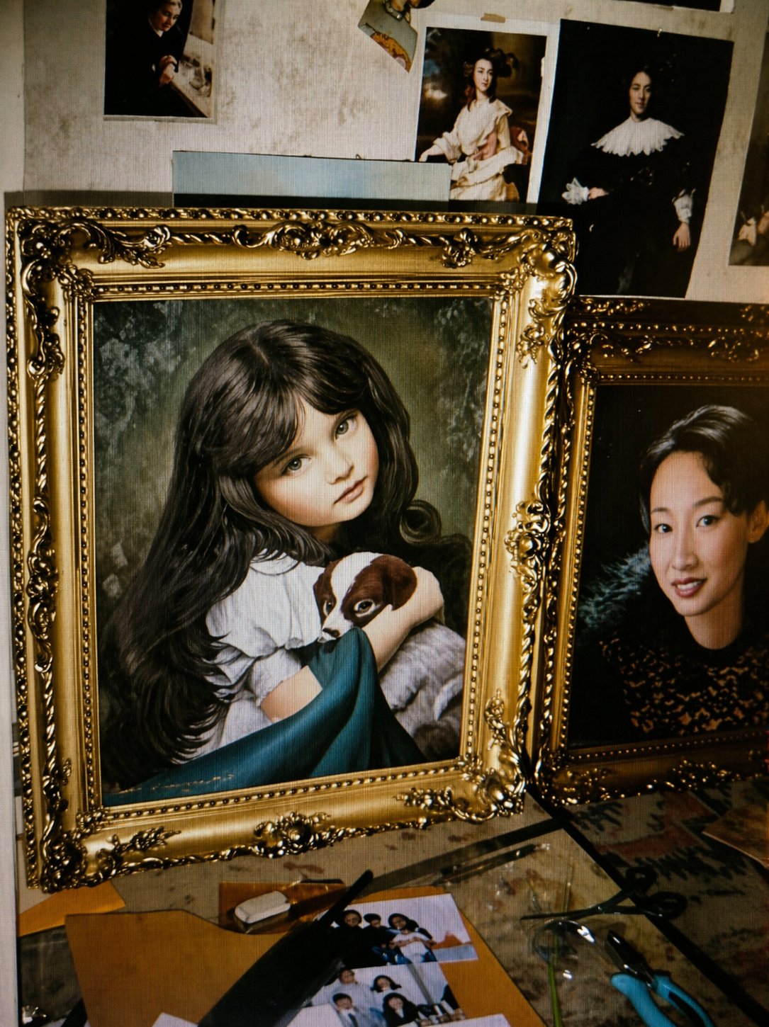 Commissioned portraits with ornate gold frames
